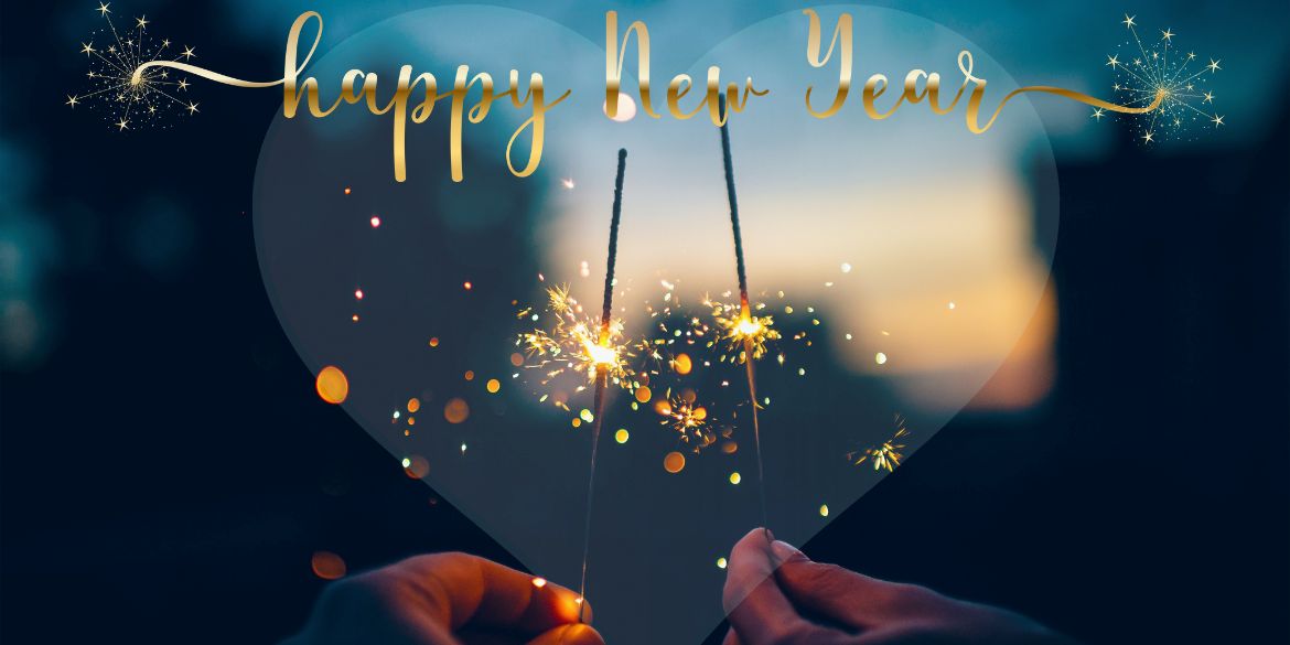 Herz mit Wunderkerzen und "Happy New Year"